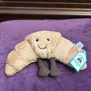 Jellycat Amuseable Croissant Plush in Tan and Brown